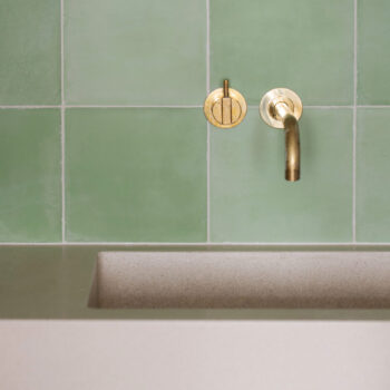 Huguet - Customized cement washbasin and green tiles with shade variations, detail.