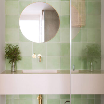 Huguet - Customized cement washbasin and green tiles with shade variations.
